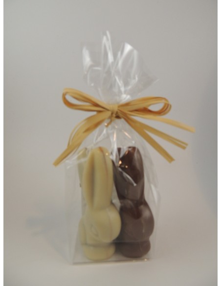 SACHET de 2 LAPIN GM LAIT OU BLANC FOURRE PRALINE .